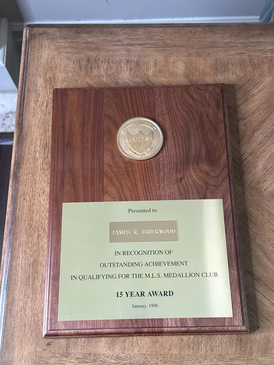 M.L.S. Medallion Club 15 Year Award plaque presented to James R. Isherwood in January 1996