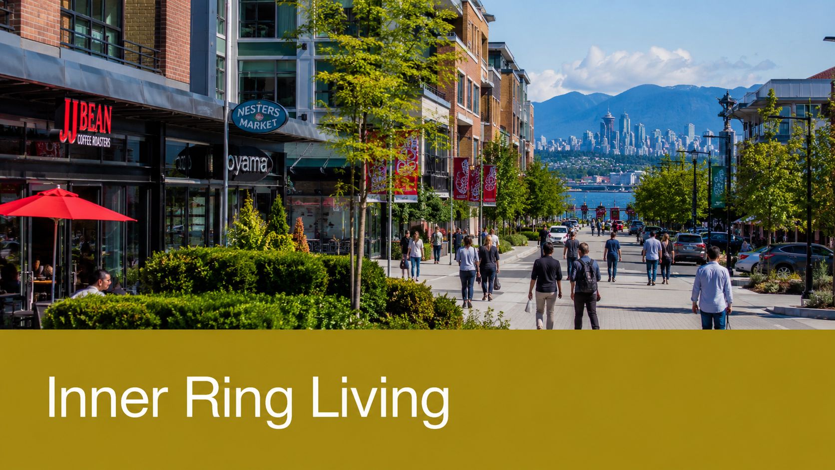 A bustling pedestrian walkway in a Vancouver neighborhood featuring shops, restaurants, and a distant city skyline.