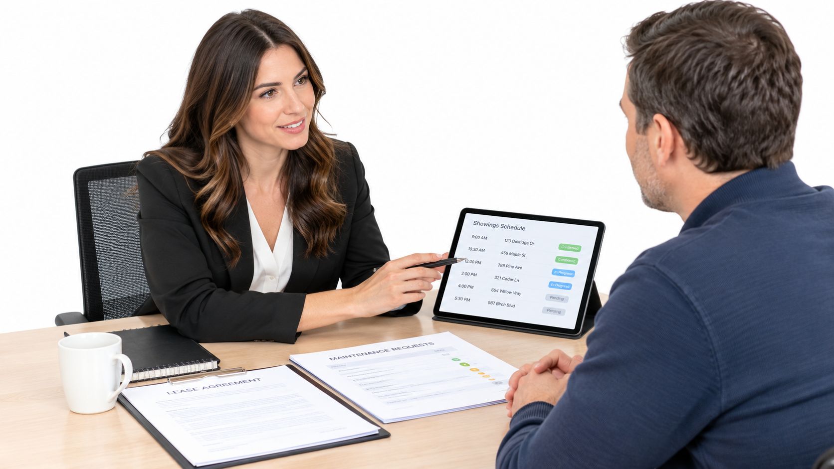 A professional property manager discussing a leasing schedule with a client in a modern office setting.