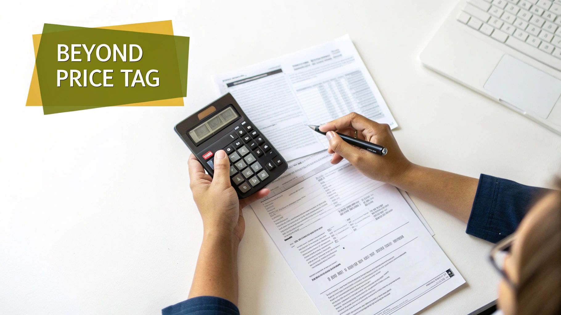 A calculator and pen resting on top of house blueprints, symbolizing financial planning for a home purchase.